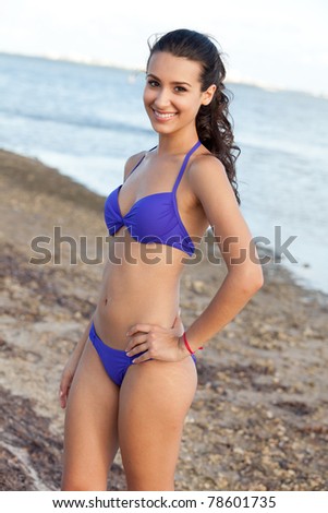 Beautiful young woman at the beach in Miami