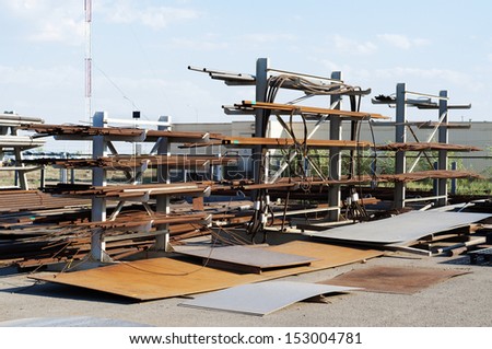 Industrial area. Metallic  materials are stored in a warehouse.