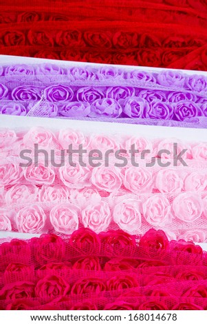 Pretty ribbons with rose patterns in a light mesh material.