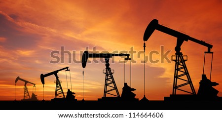 Oil pump oil rig energy industrial machine for petroleum in the sunset background for design