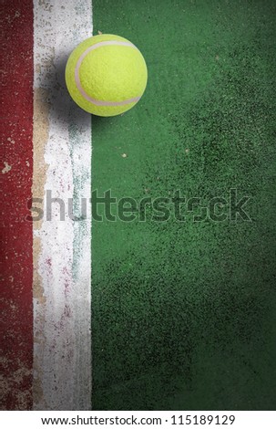 tennis ball on the old court orange and net background for design