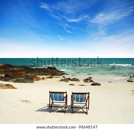 sea sand sun beach together blue sky chair alone background design stone clear