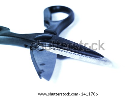 Cutting Edge of a scissors. Focus on the cutting edge, Intentional selective focus, shallow DOF. Object Shot