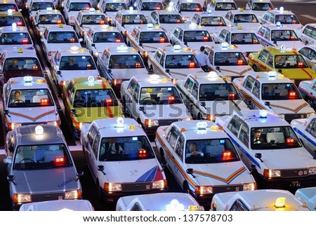 SENDAI, JAPAN - OCTOBER 29: Rows of Taxis October 29, 2012 in Sendai, JP. Japanese taxi fares are considered the highest in the world.
