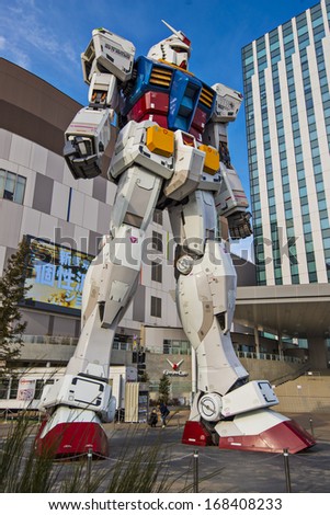 TOKYO - FEBRUARY 7: Gundam Mobile Suit Replica February 7, 2013 in Tokyo, JP. The 1/1 scale 18m tall statue was built as part of the 30th anniversary of the Gundam series.