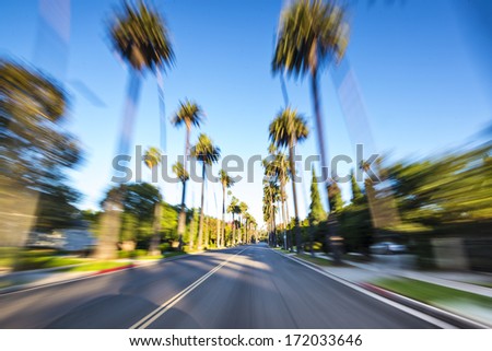 Similar – Image, Stock Photo Driving through Los Angeles in a convertible. LA, California.