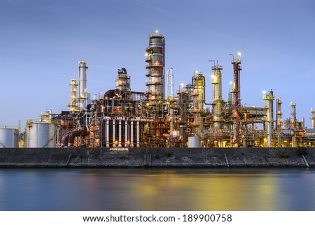 Oil refineries line a river in Yokkaichi, Japan. The city has been a center for the chemical industry since the 1930\'s.