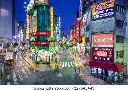 TOKYO, JAPAN - DECEMBER 17, 2012: Nightlife in the Shinjuku District. The area is a famed nightlife and red-light district.