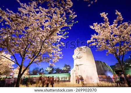 WASHINGTON - APRIL 12, 2015: The memorial to the civil rights leader Martin Luther King, Jr. towers over crowds during the spring season in West Potomac Park.