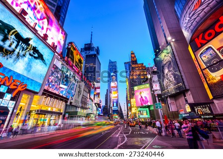 NEW YORK CITY - APRIL 9, 2013: Times Square crowds and traffic at night. The site is regarded as the world\'s most visited tourist attraction with nearly 40 million visitors annually.