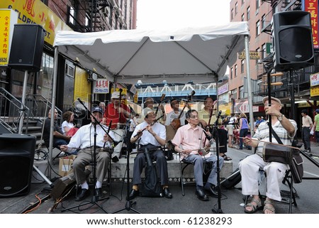 NEW YORK CITY - JUNE 6: Musicians play traditional chinese music at the annual Eldridge Street Festival June 6, 2010 in New York, New York.