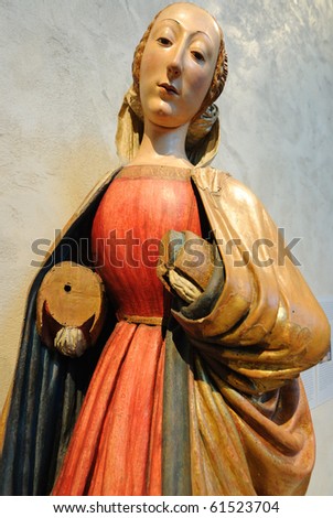 a medieval wooden depiction of Mother Mary on display at the cloisters in New York City.
