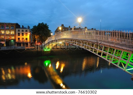 The Ha\'penny Bridge over the  River Liffey in Dublin, Ireland.