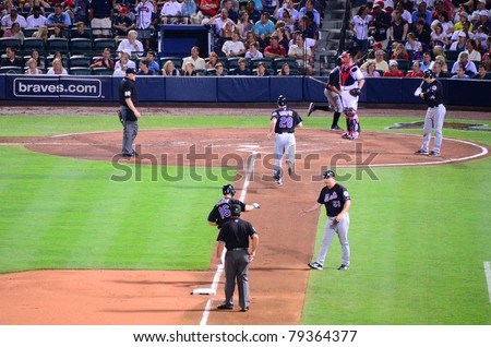 ATLANTA, GEORGIA - JUNE 16: Mets hit a homerun at Turner Field during a game between the Atlanta Braves and New York Mets June 16, 2011 in Atlanta, Georgia.