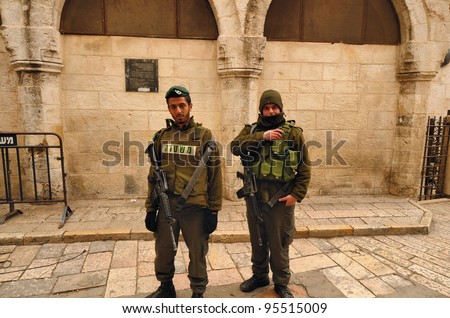 JERUSALEM - FEBRUARY 17: Members of the Israeli Border Police in the Old City February 17, 2012 in Jerusalem, Israel. They are deployed for law enforcement in the West Bank and Jerusalem.