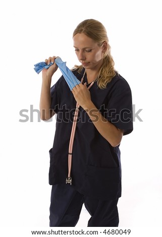 Young blond woman in medical scrubs