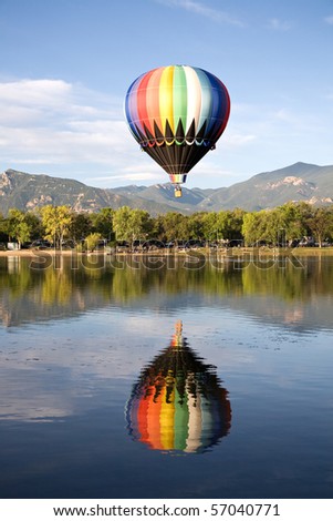 A Hot Air Balloon Rises Above Prospect Lake During The Colorado Springs ...