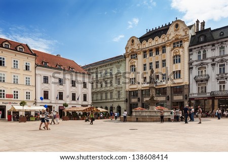 BRATISLAVA, SLOVAKIA - MAY 8: People visiting Main City Square in Old Town on May 8, 2013 in Bratislava, Slovakia. Bratislava is the most populous (462,000) and most visited city in Slovakia.