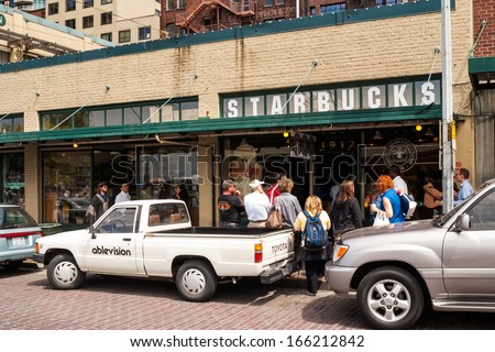 SEATTLE - MAY 18: Original Starbucks store at 1912 Pike Place on May 18, 2007 in Seattle. Serving coffe in 20.891 stores in 62 countries, Starbucks is world\'s largest coffeehouse company.