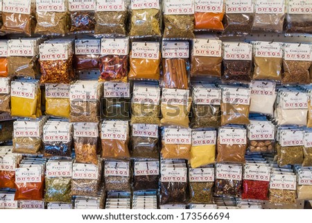 VANCOUVER, CANADA - MAY 17, 2007: Spices in plastic bag on display for sale in Granville Island Public Market Duso\'s Spice Shop. Shop opened in 1979 and produces authentic Italian pasta and sauces.