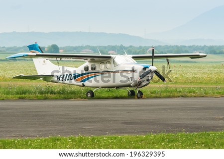 ZAGREB, CROATIA - JULY 18, 2008: Cessna P210N Centurion parked on a grass airfield Lucko. Six-seat, single-engined general aviation aircraft was first flown in 1957 and produced by Cessna until 1985.