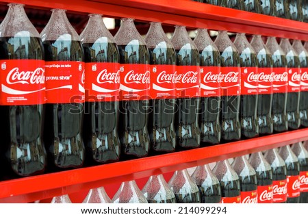 VARAZDIN, CROATIA - AUGUST 31, 2014: Plastic bottles of Coca Cola on display on Coca Cola stand during Varazdin Spanirfest festival. Coca Cola Company is leading soda drinks manufacturer in the world.