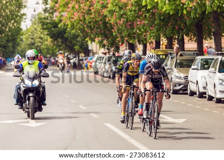 ZAGREB, CROATIA - APRIL 26, 2015: Unidentified bikers racing on streets of Zagreb during final 5th race in Tour of Croatia, international cycling race run along Adriatic coast, Istria and inland.