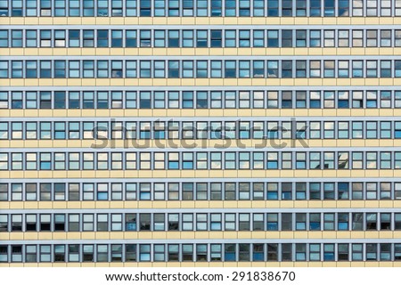 Abstract background - windows of a modern building in a row, view from front