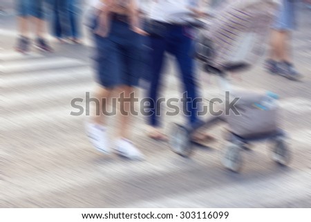 Defocused people crossing zebra, blurred and color graded, with instagram effect