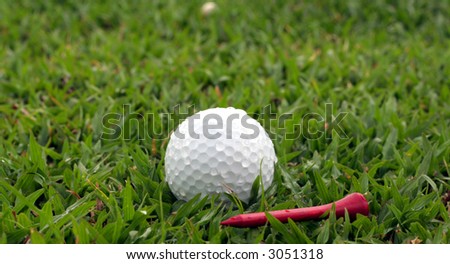 Golf ball and a Red Tee