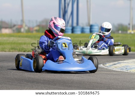 BUCHAREST, ROMANIA - APRIL 21: Alexandra Marinescu, number 1, competes in National Karting Championship, Round 5, on April 21, 2012 in Bucharest, Romania.