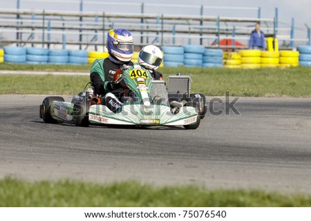 BUCHAREST, ROMANIA - APRIL 9: Calin Tariceanu competes in National Karting Championship on April 9, 2011 in Bucharest, Romania.