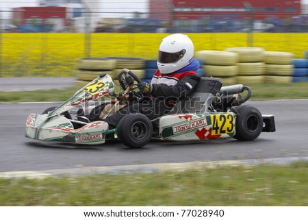 BUCHAREST, ROMANIA - MAY 8: Razvan Popiel competes in South East European Karting Zone Championship on MAY 8, 2011 in Bucharest, Romania.