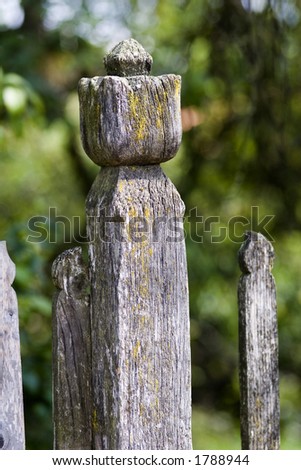 old wood fence with cutting ornaments