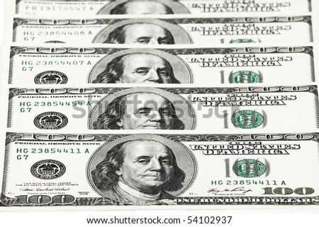 US Dollar bills represent day to day economic activities.