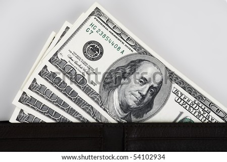 US Dollar bills represent day to day economic activities.