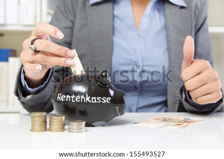 Hands of woman paying money for pension fund