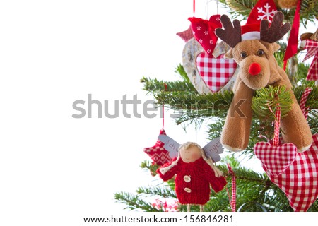Christmas tree with red and white hanging decoration with elk on isolated white background