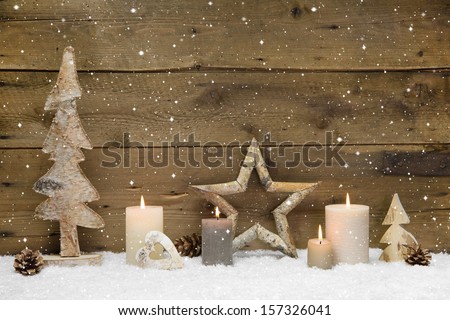Rustic country background - wood - with candles and snowflakes for christmas