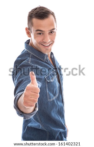 Young laid back man giving thumbs up to camera in blue denim shirt isolated on white background