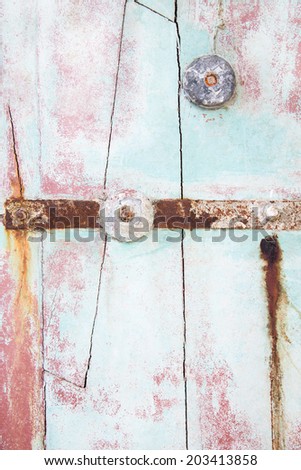 Old wooden background of drift wood in pastel mint green color.