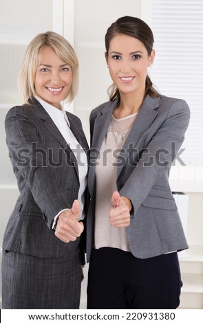 Portrait: Successful business woman team making career in management positions.