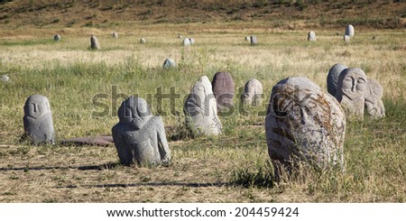 Ancient stone sculptures near Old Burana tower located on famous Silk road, Kyrgyzstan.