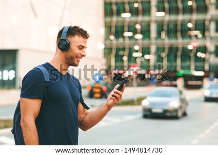 Similar – Image, Stock Photo man walking around on the street visiting Bilbao city Spain