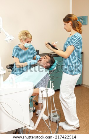 Man at the dentist on dental check