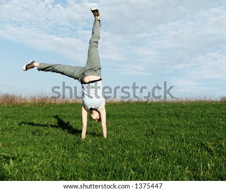 cartwheel in the nature,summer time,recreation,freedom