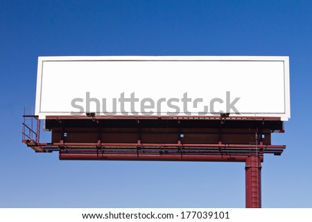 Blank panoramic billboard advertising sign on blue sky background with space for your message