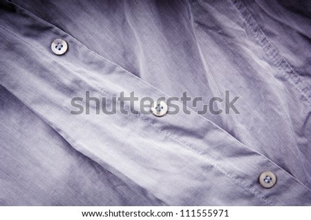 Crumpled, creased un-ironed business shirt and buttons