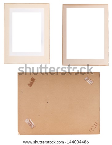 Collection of old photo frames, edges and backings with sticky tape isolated on white