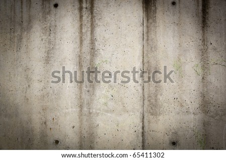 Concrete wall texture in rough, grunge style with stains and wear